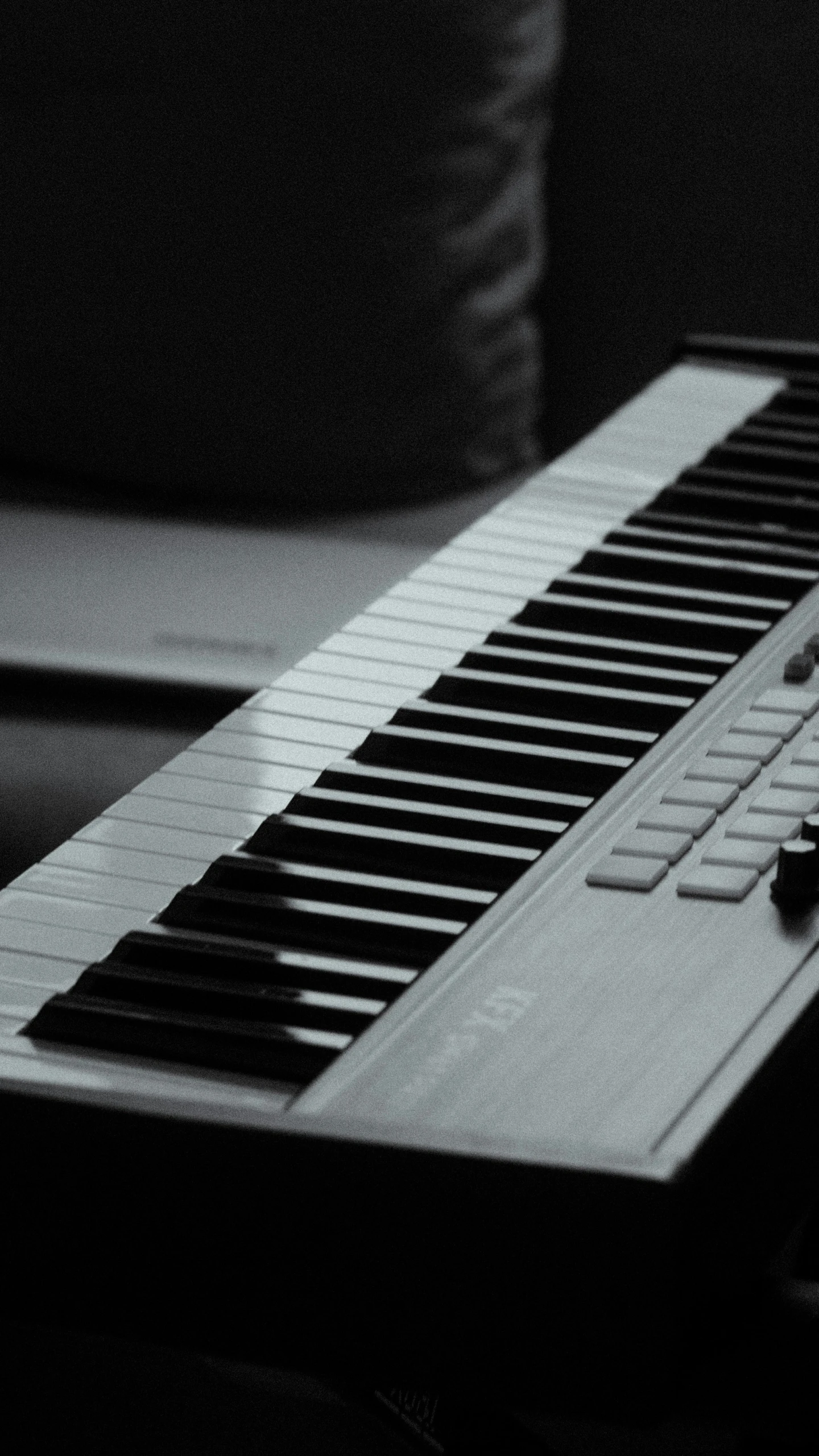 black and white po of a keyboard with keys