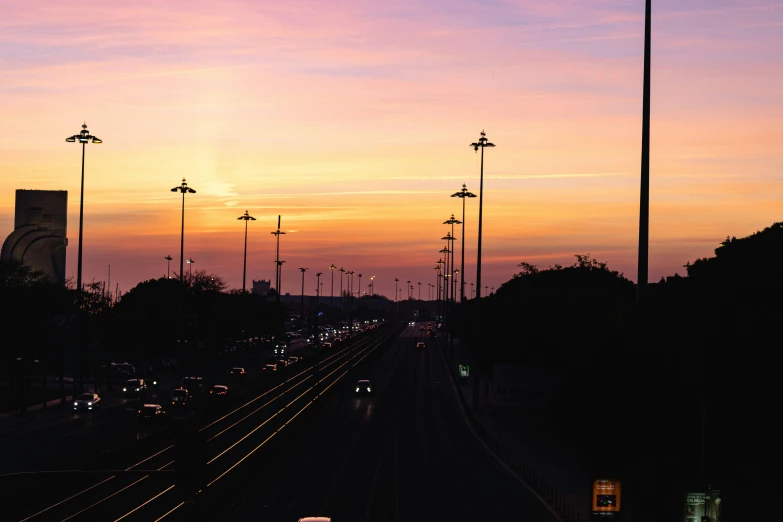 the sky is covered with some pinkish colors at sunset