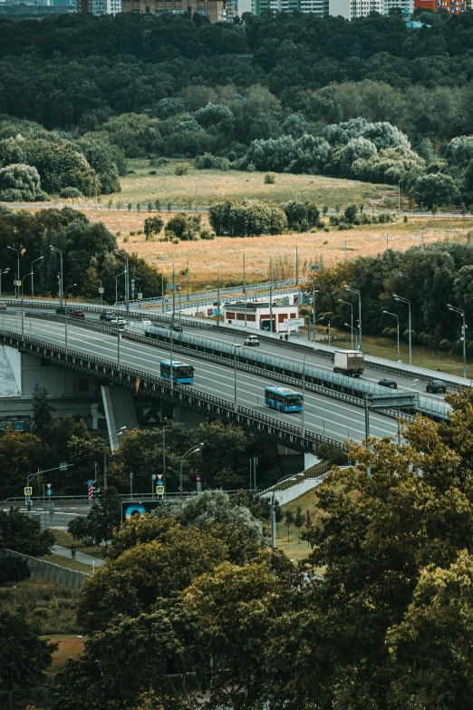 a freeway filled with lots of traffic and parked trucks