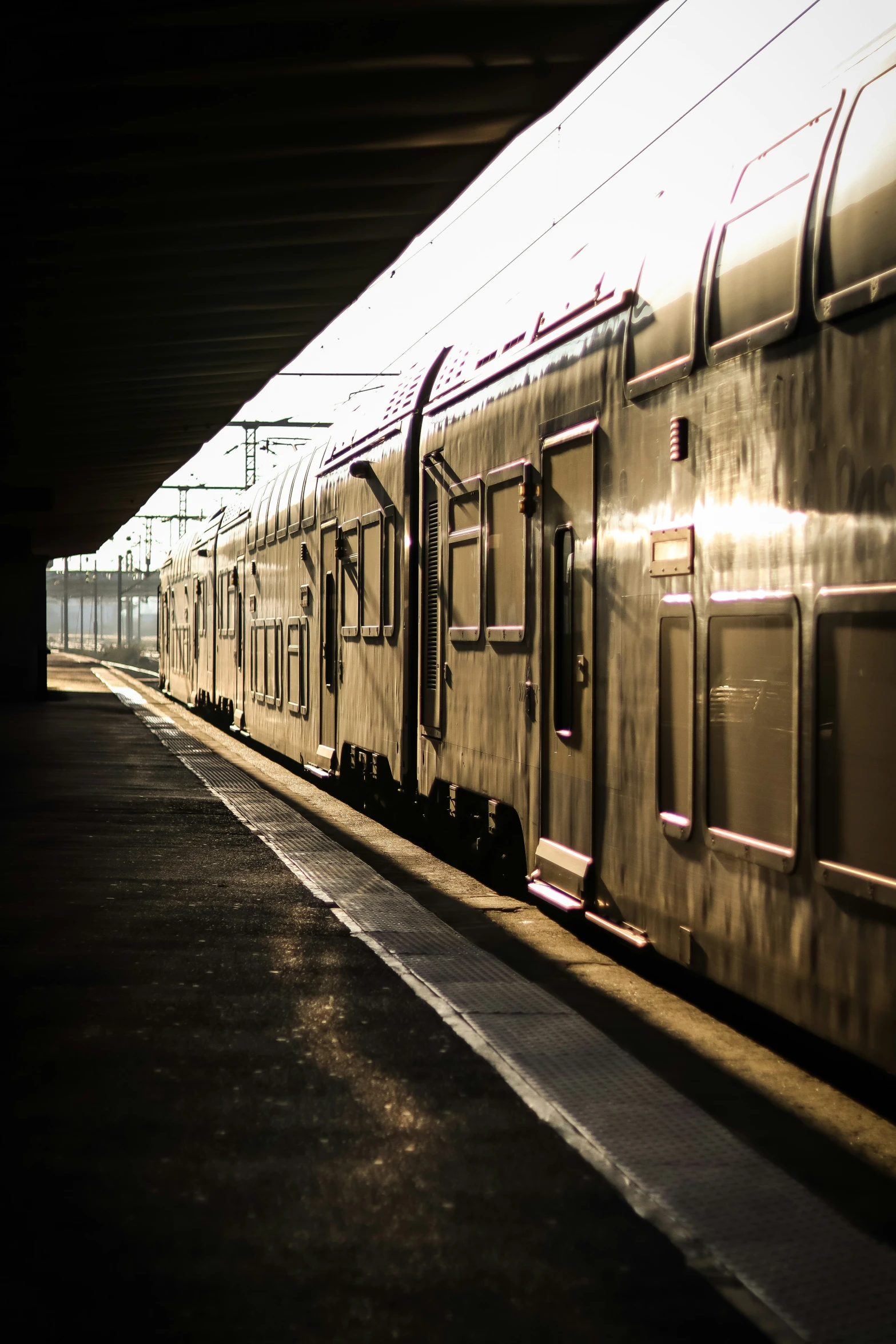 view from inside the window of a train in a station