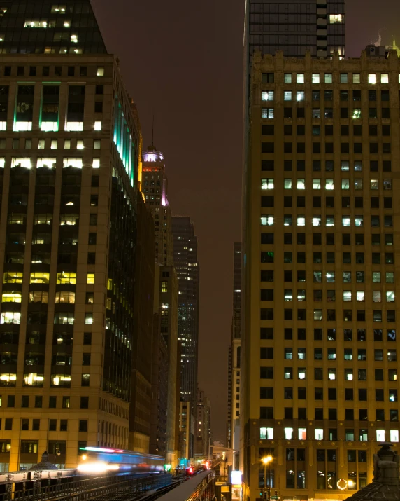 a row of tall buildings stand next to each other