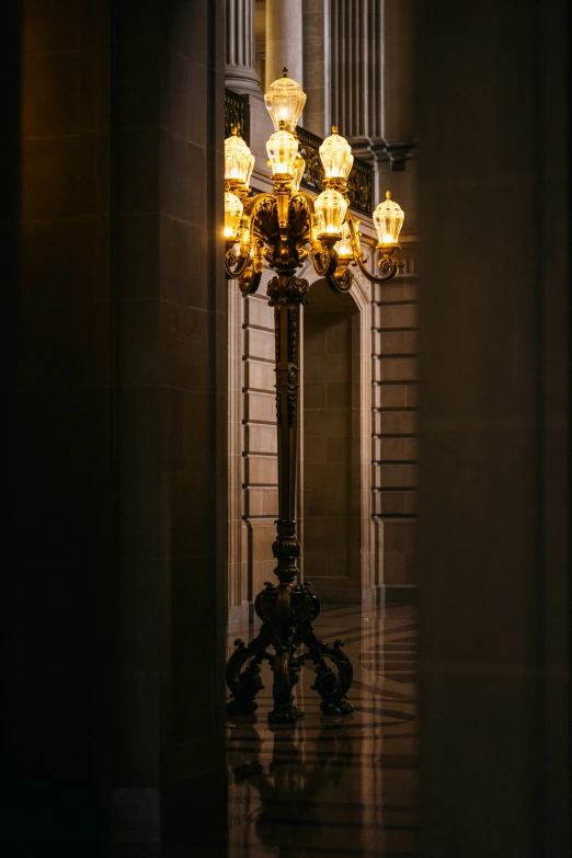 a lamp is lit up in an old building