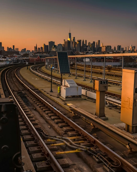 some trains are running along side a train track