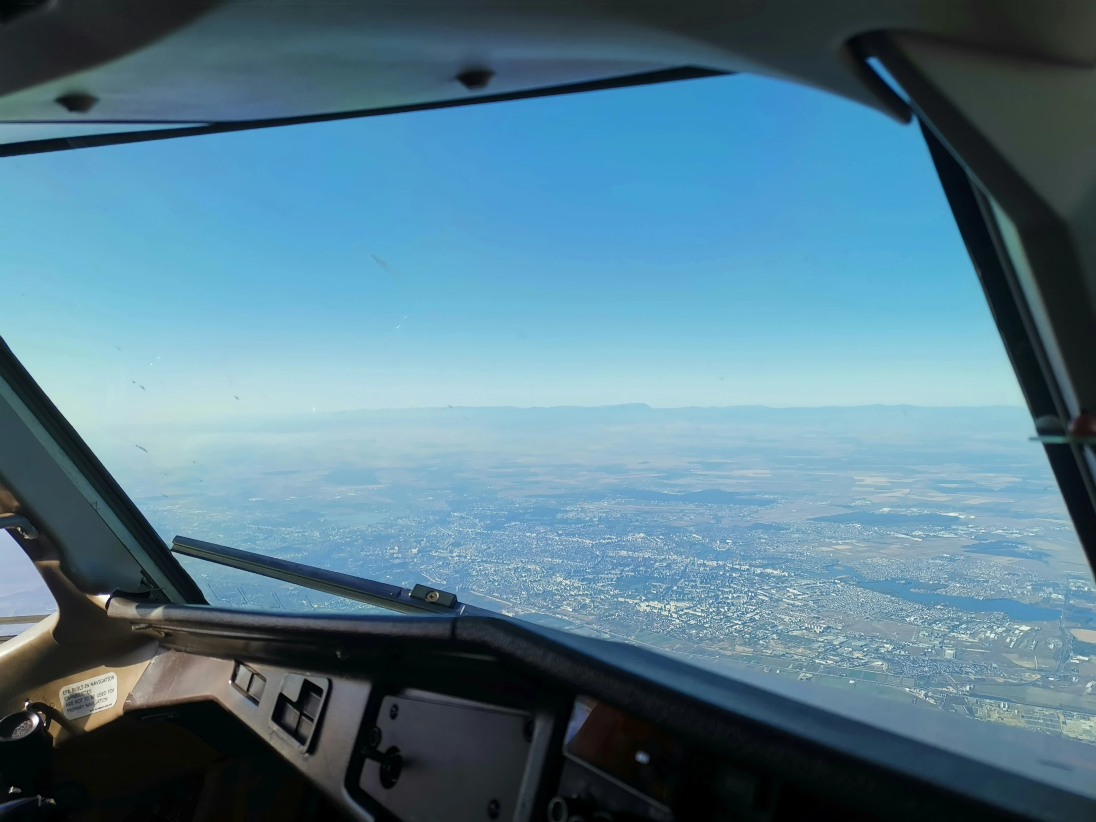 an aerial view out of a plane's cockpit as seen from above