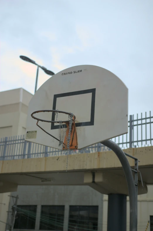a basketball hoop with some wires around it