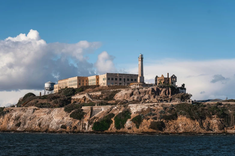 a castle is sitting atop of an island