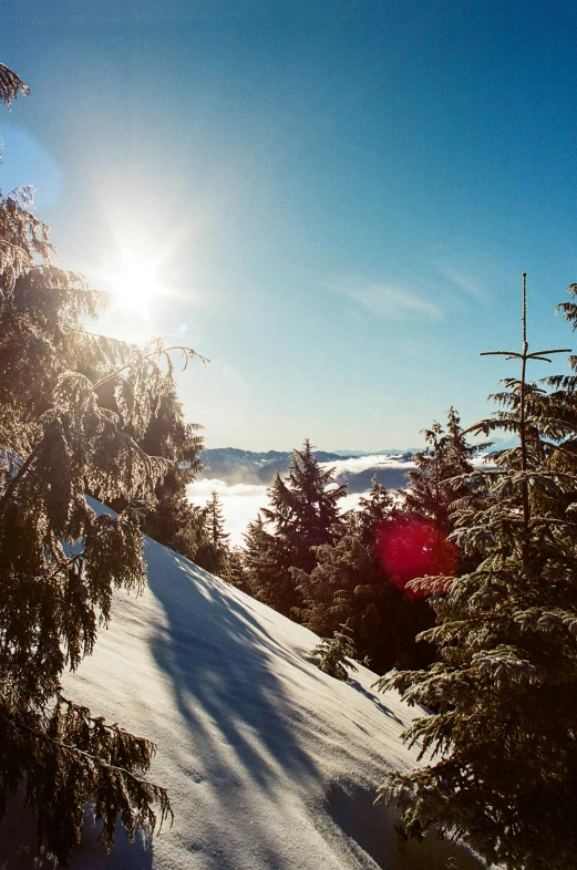 a person riding skis on a snow covered slope