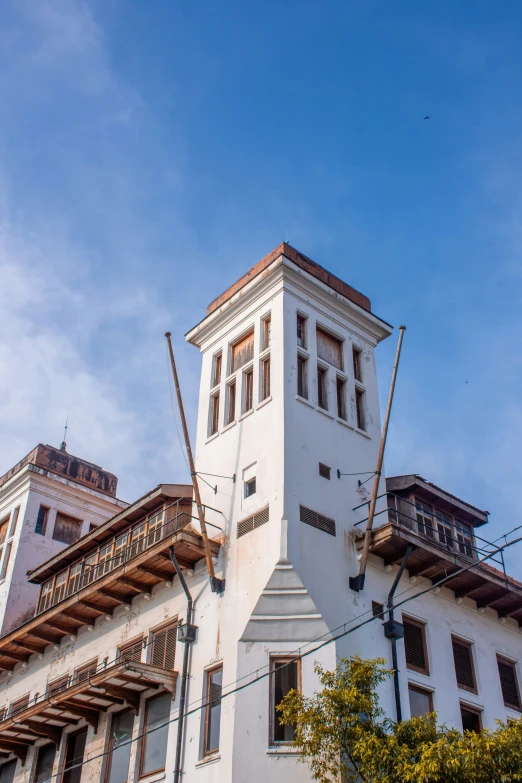 a tower in the middle of an urban area