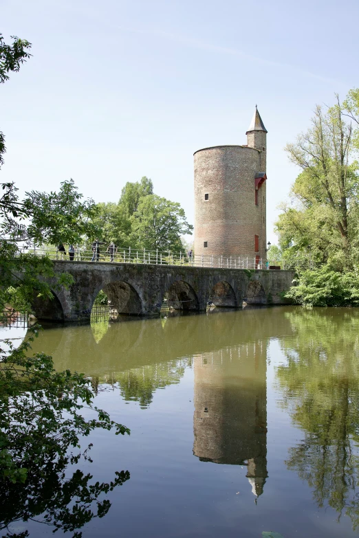 the water and bridge at the tower have been reflective