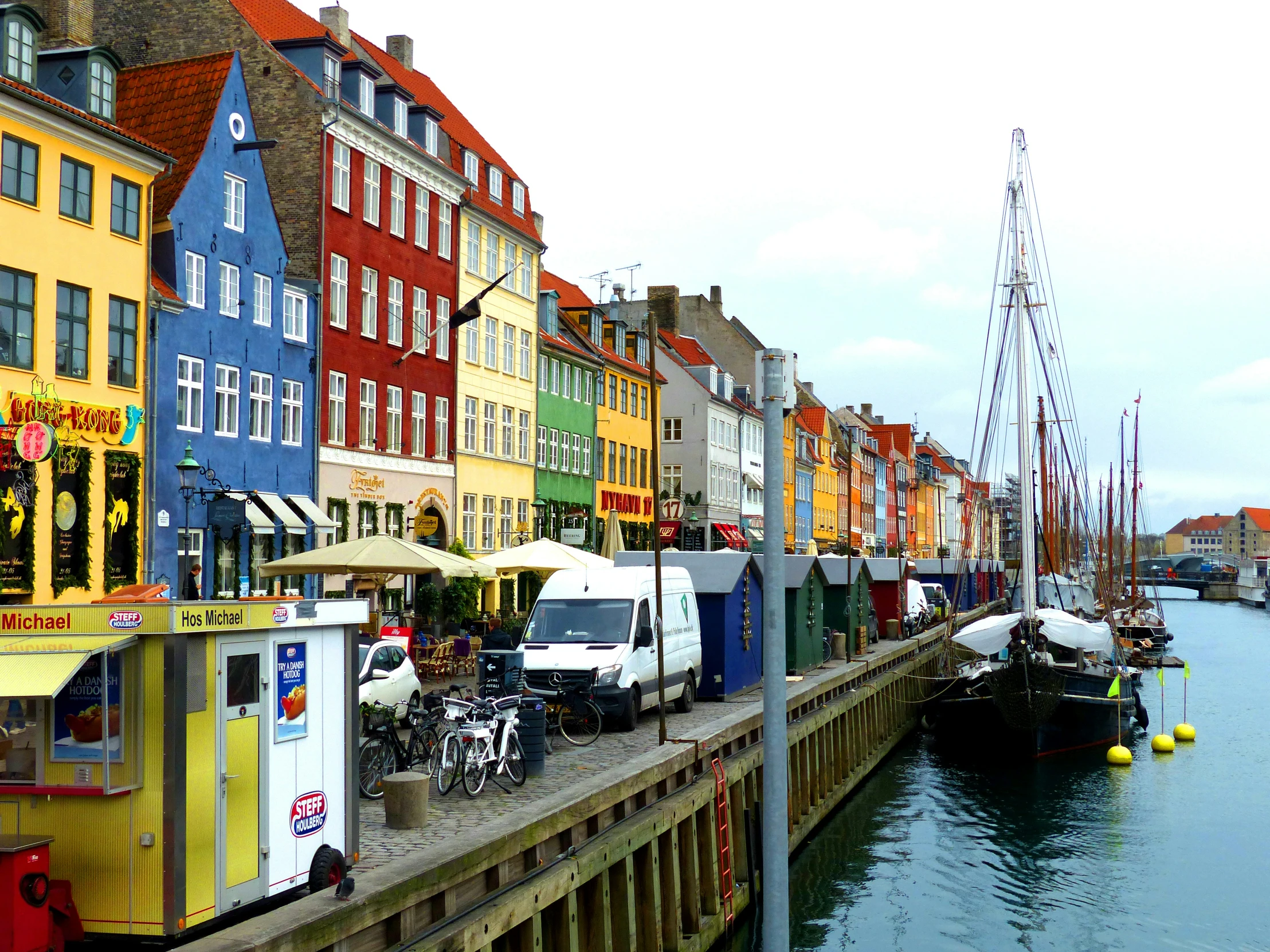 buildings lined along the edge of a body of water