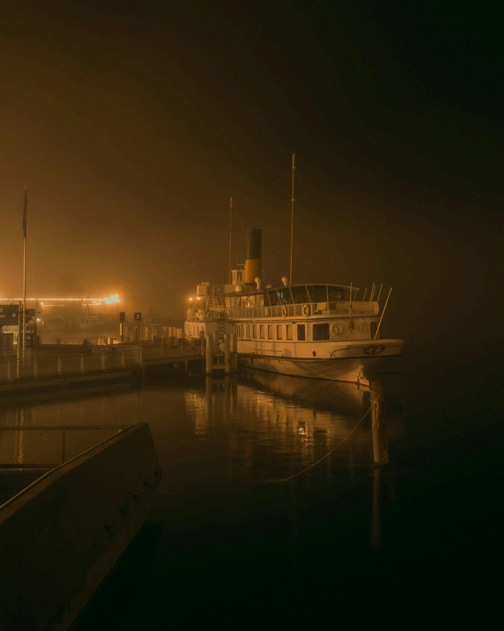 a harbor filled with lots of boats in the night