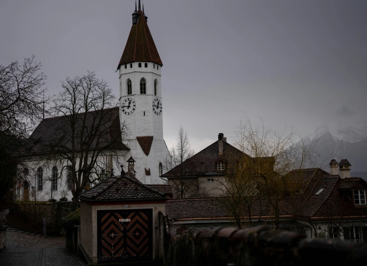 an old church sitting on top of a hill