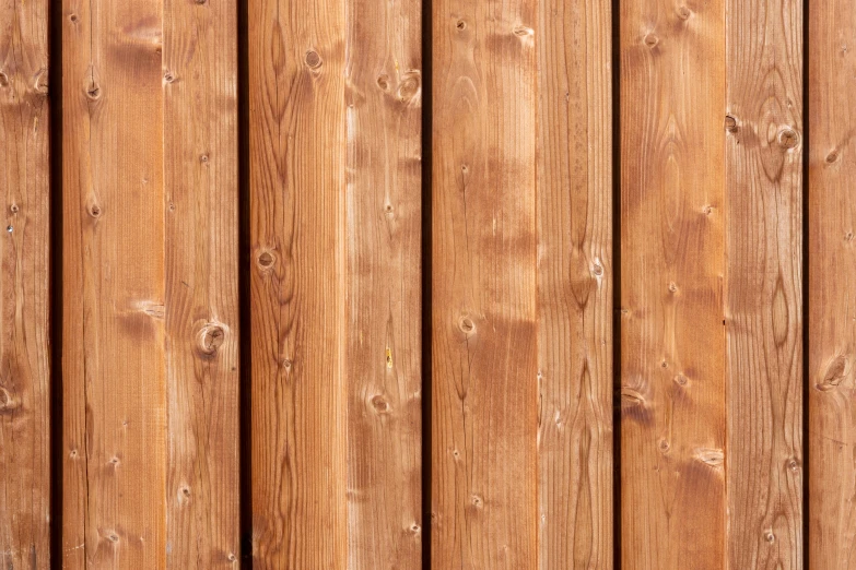 wood fence paneling as background or texture in brown tones