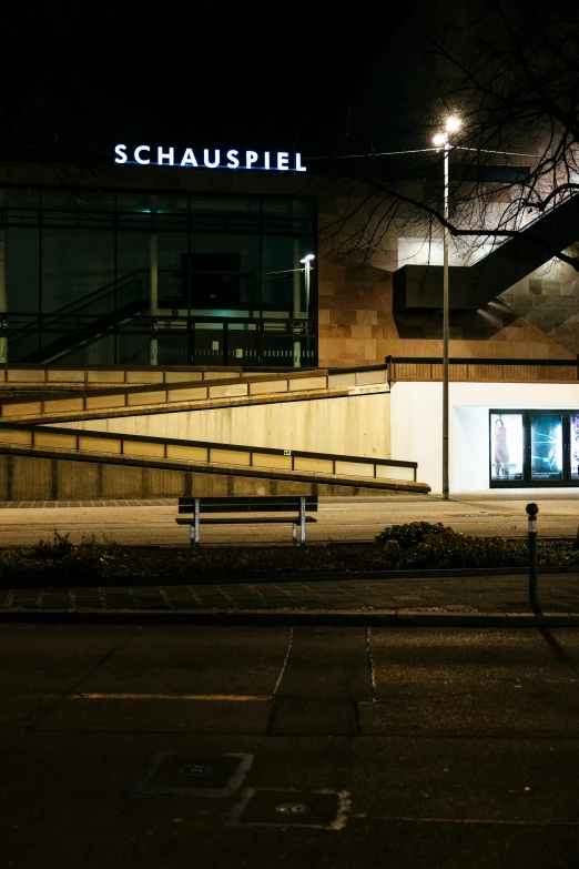 a staircase on the outside of a building with lights