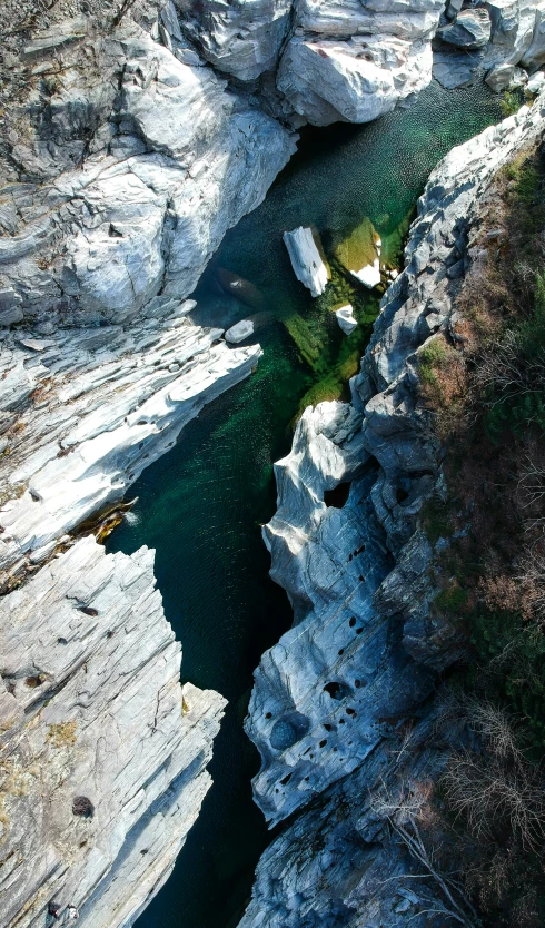 a very steep and narrow river by some rocks