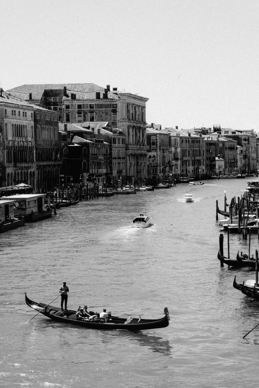 an old po of a person in a canoe near the dock