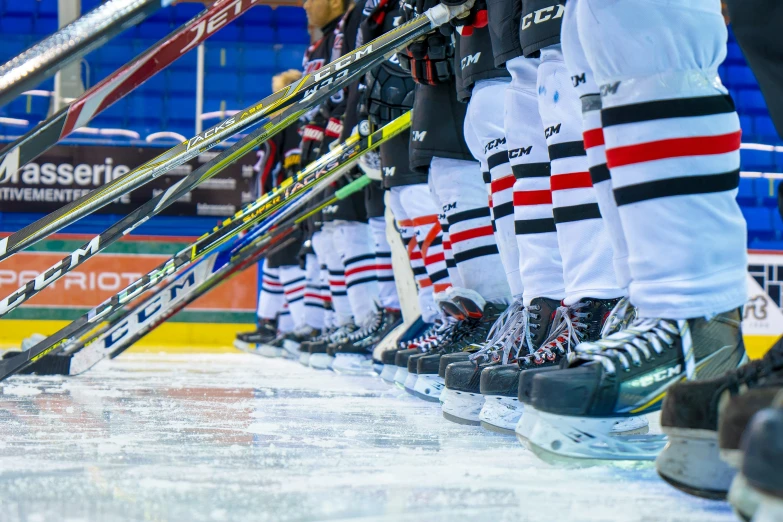 a row of different skis are shown on the ice