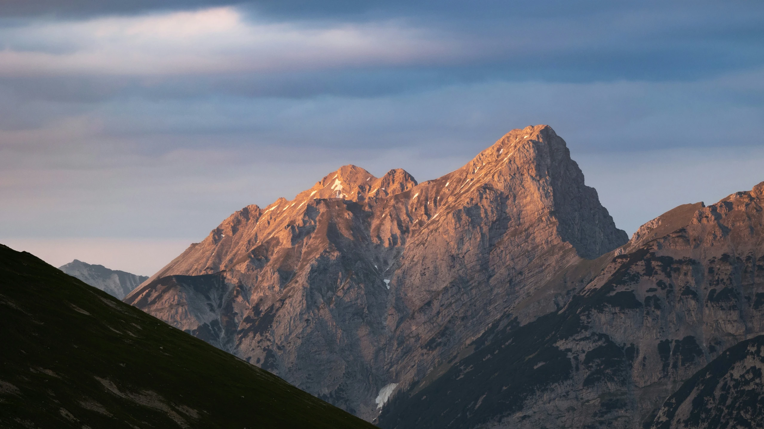 a view of the mountains from the ground