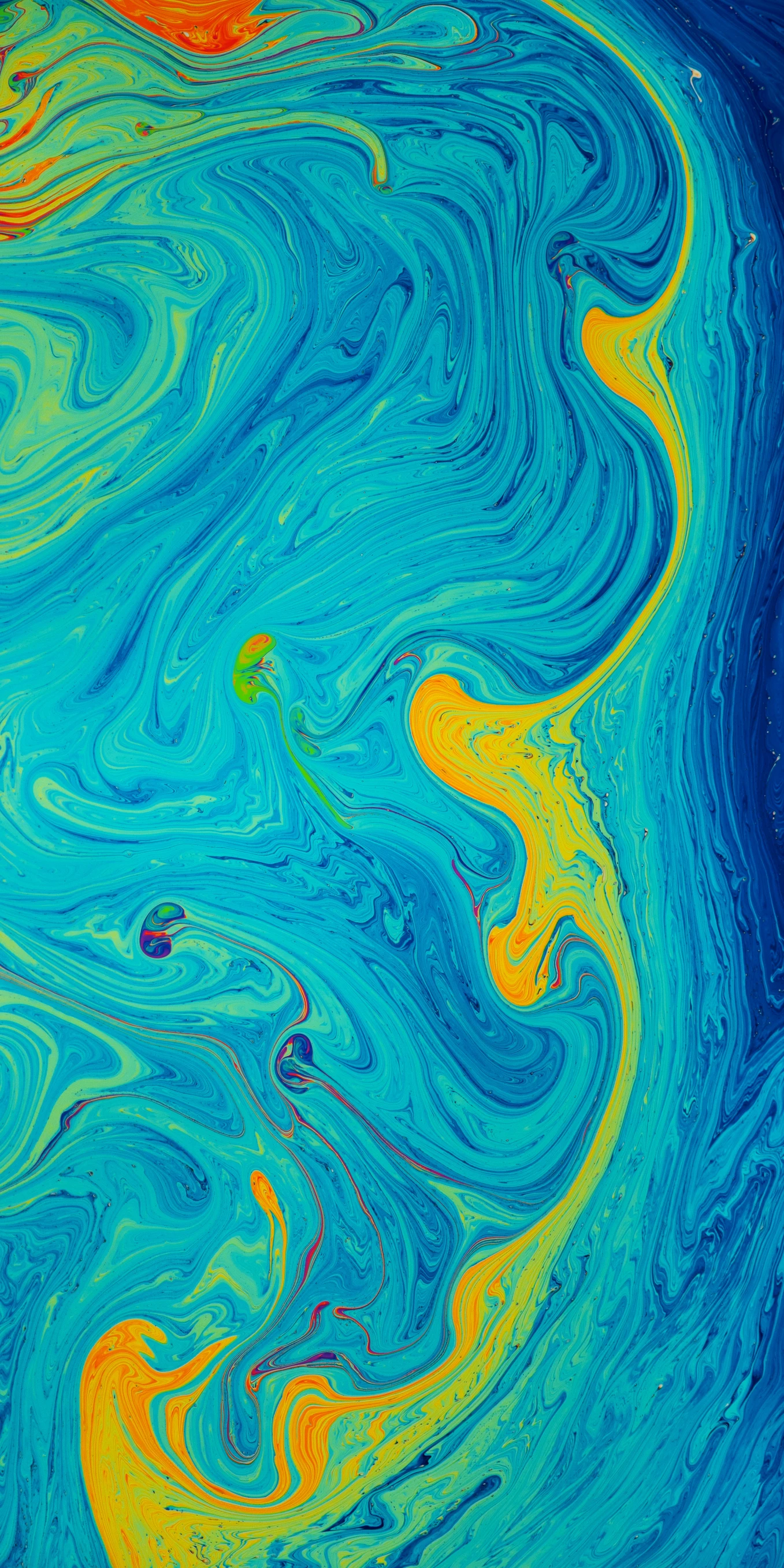 colorful patterns are shown on the surface of a blue, yellow and white paint