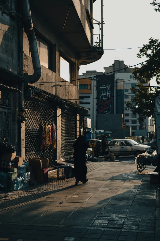 a man standing in front of an empty street