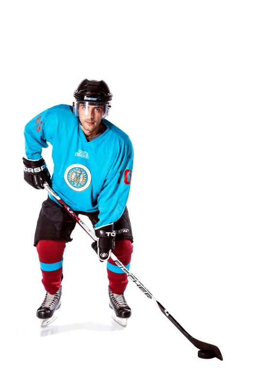 a hockey player is standing and wearing his gear