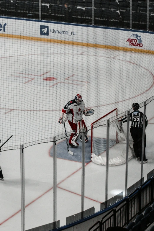 a group of young men playing a game of hockey