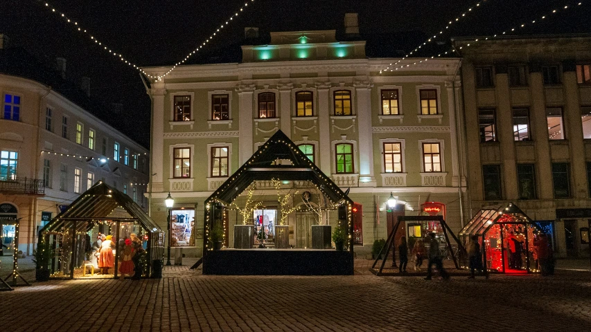 a city square has many buildings and decorations