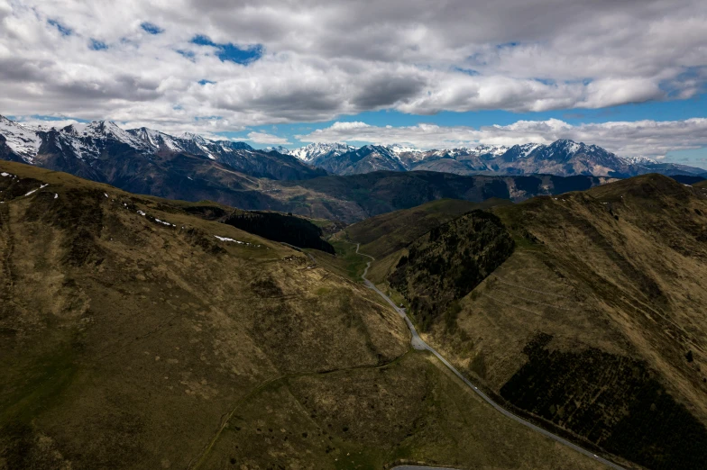 the view looking down from the summit of a mountain