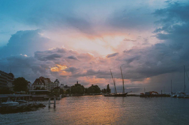 boats on the water in the evening time