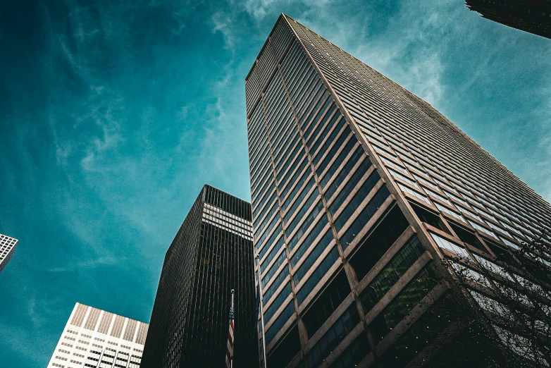 skyscrs with a clear blue sky in the background