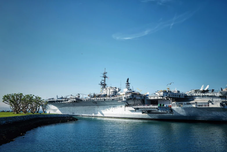 two large ships are docked next to each other