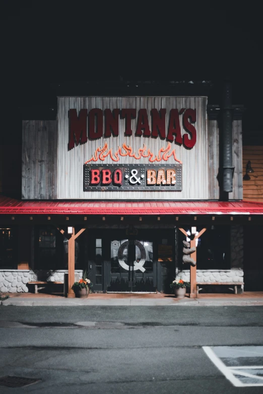 a bar with two benches in front of it