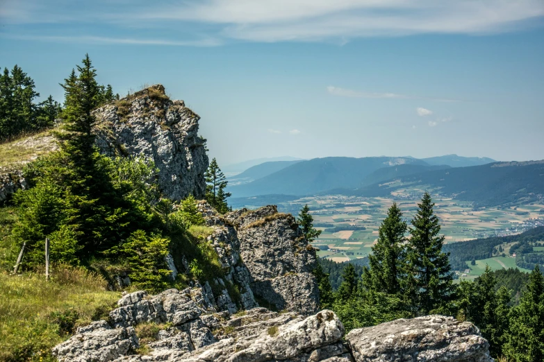 the view of mountains from a high cliff