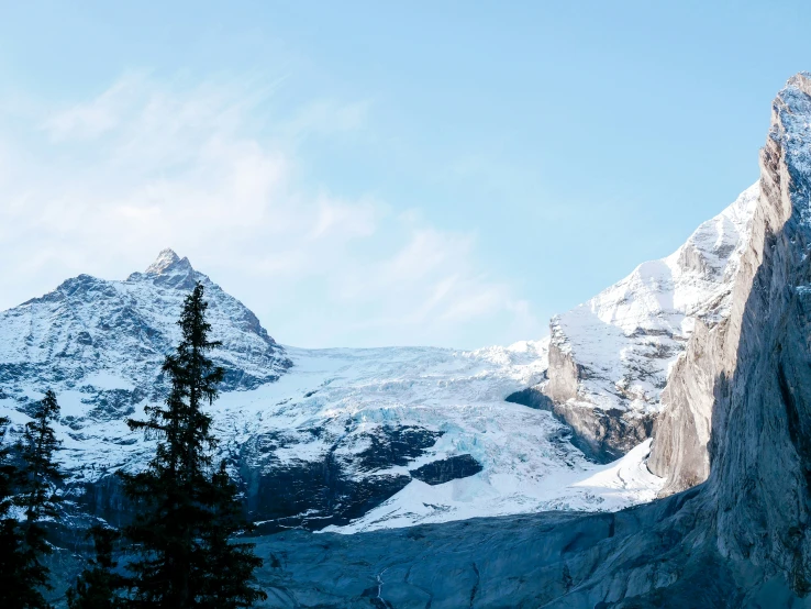 the mountain has two snow covered mountains in it