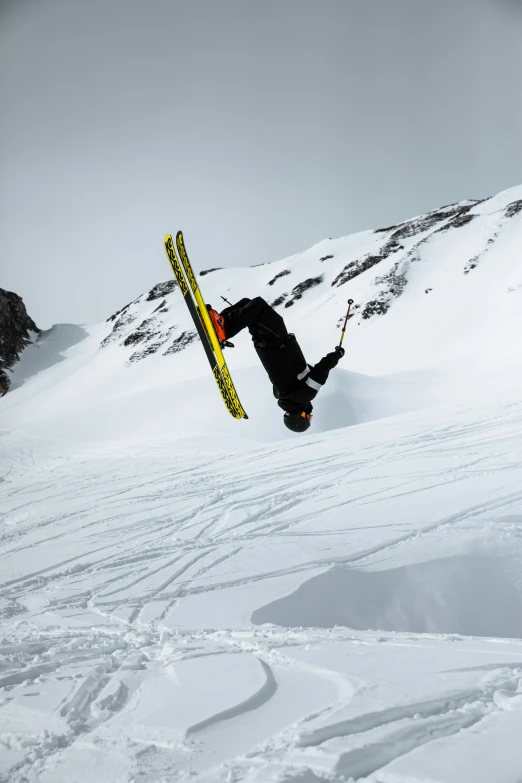 a person that is doing some tricks in the snow