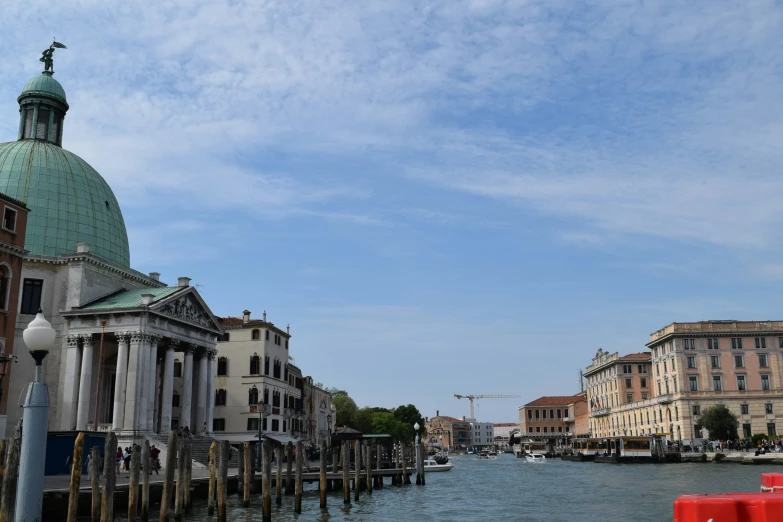 a body of water in the middle of two buildings