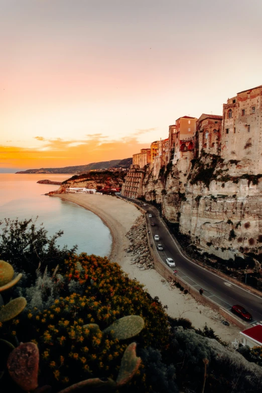 the road along the sea leads to the cliffs and cliffs