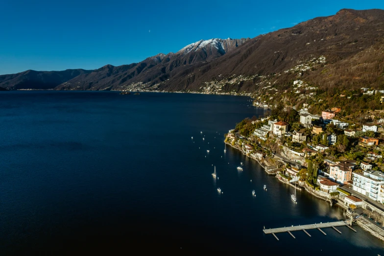 an aerial view of a harbor in the mountains