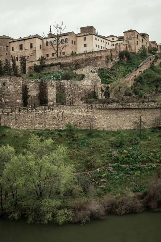 a view of an old village and river