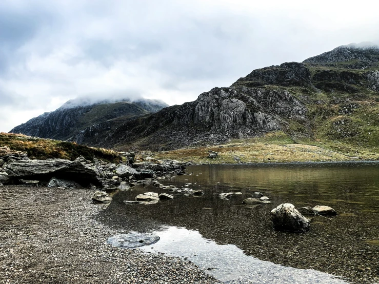 there is a rock that has fallen from the mountains