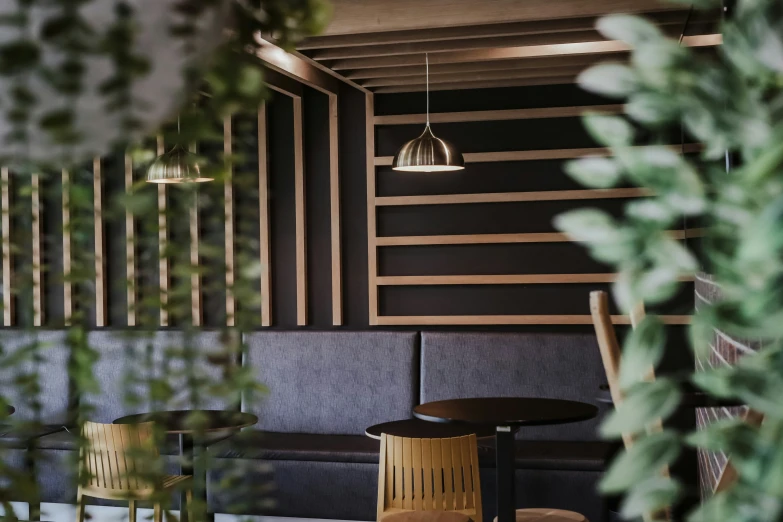 the interior of an open restaurant with several tables and chairs