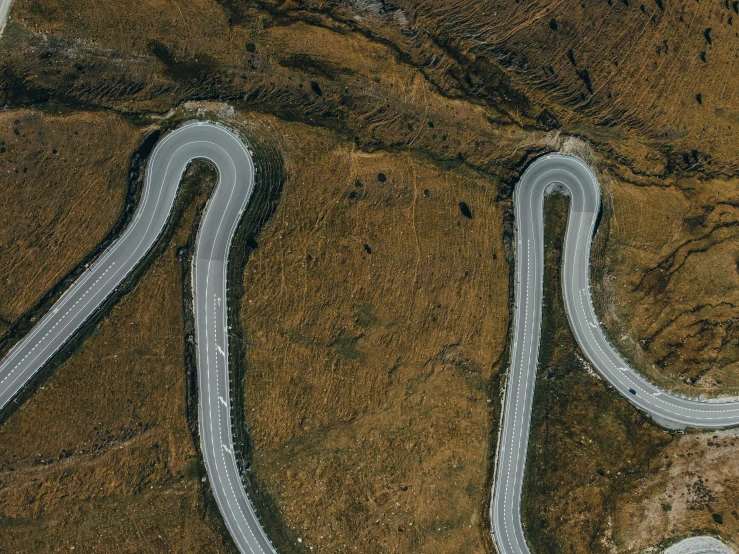 a road winding up into a curve