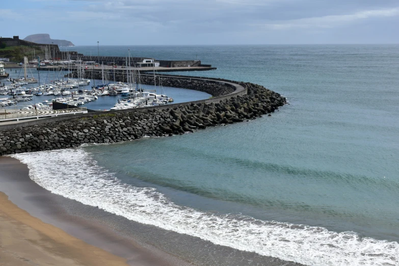 an empty marina at the edge of a beach