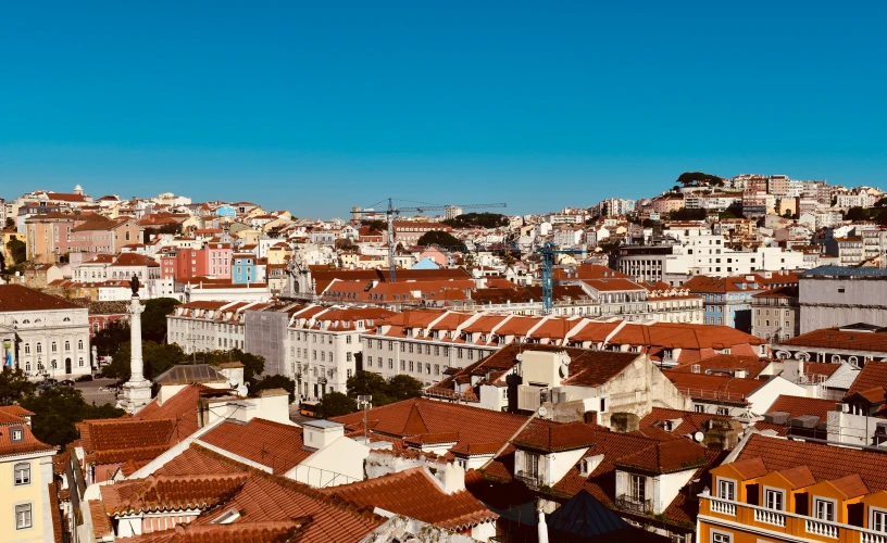 many buildings in the distance with one building on top