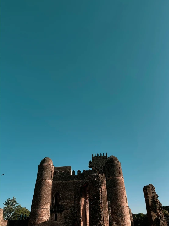 a large tower that has a sky in the background