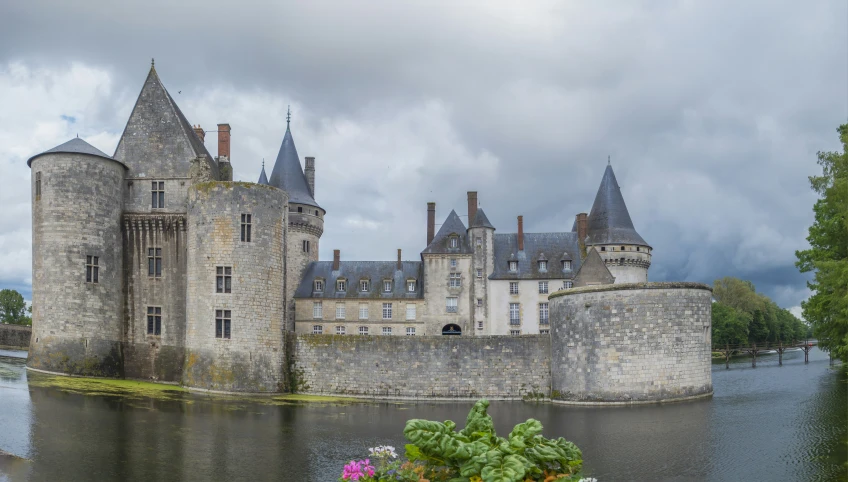 a castle that is next to a body of water