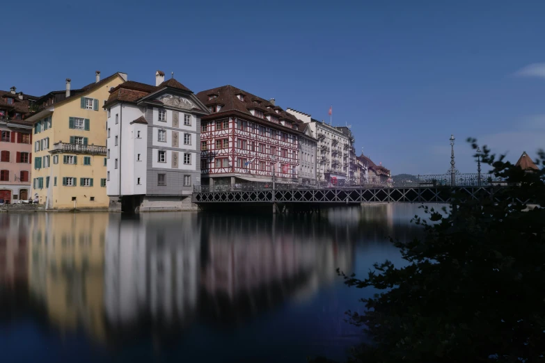 several buildings sitting along a body of water