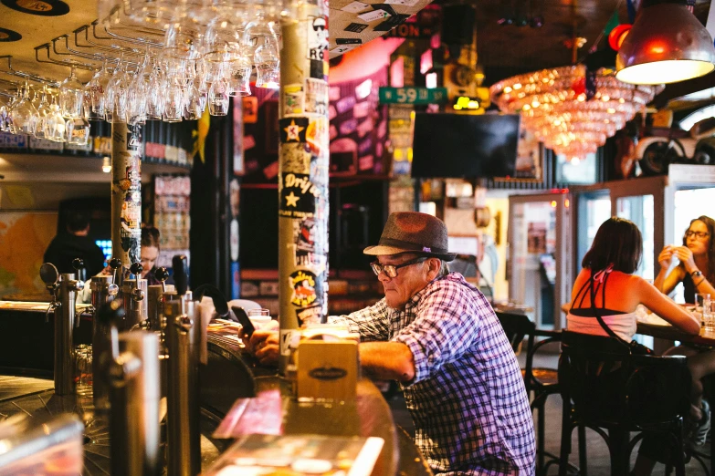 a bar in a restaraunt that is very well stocked