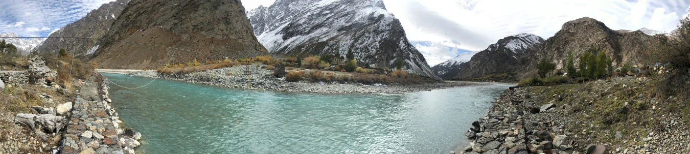 the lake below is blue and calm