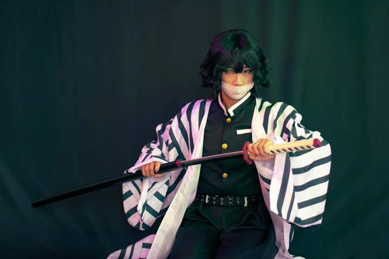 a person in a striped costume with a sword